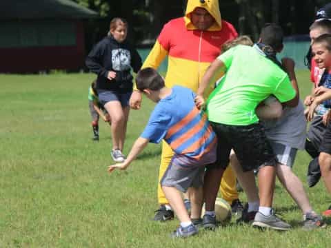 a group of people playing rugby