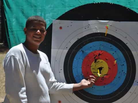 a man holding a drawing