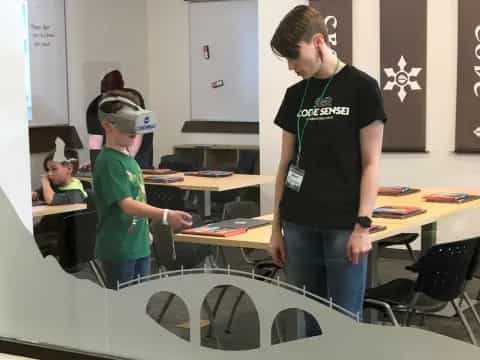 a man and a boy in a classroom