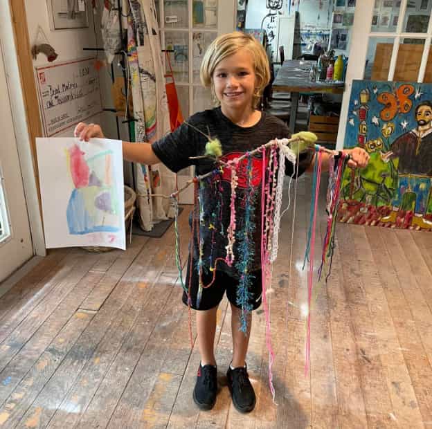 a girl holding a string