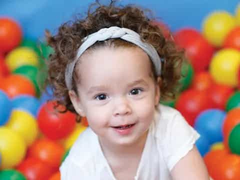 a child in a ball pit