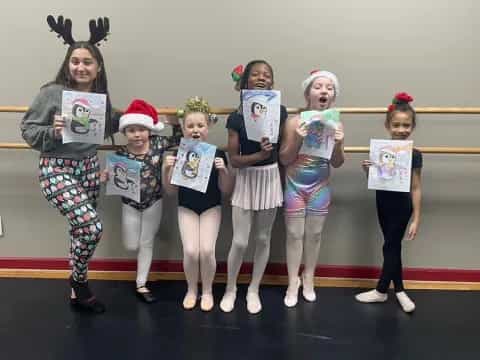 a group of women holding signs