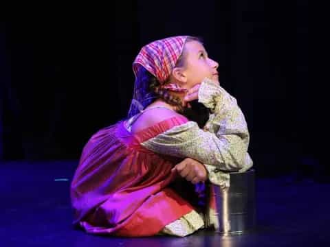 a person in a pink dress