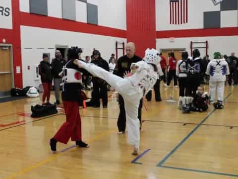 a group of people in a gym