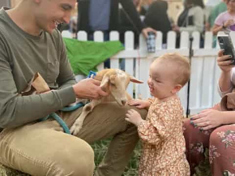 a person holding a baby