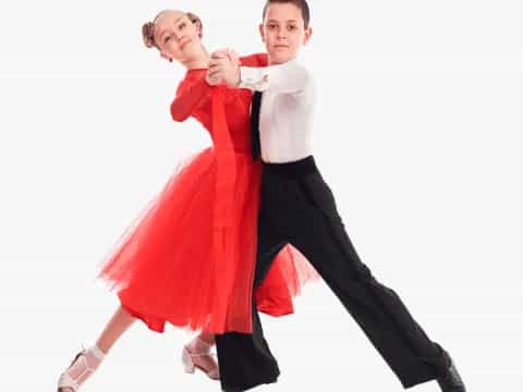 a man and woman dancing