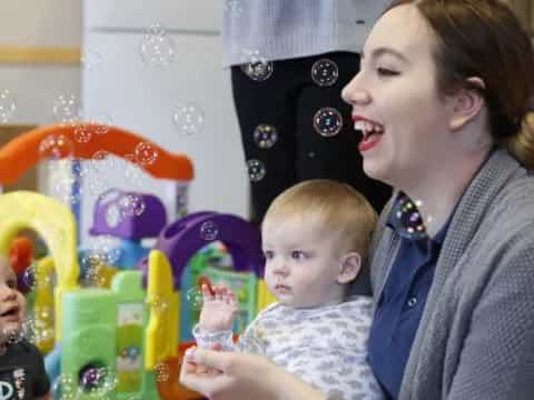 a person holding a baby
