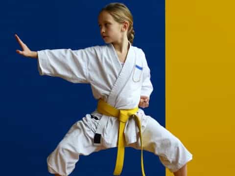 a man in a karate uniform