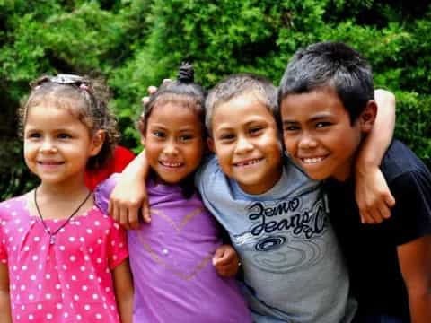 a group of children smiling