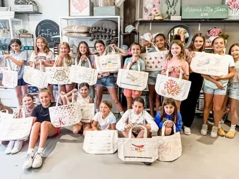 a group of children holding signs