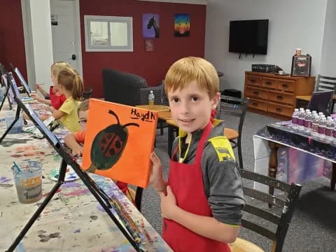 a boy holding a flag