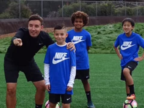a group of boys playing football