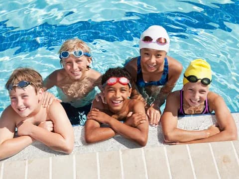 a group of people in a pool