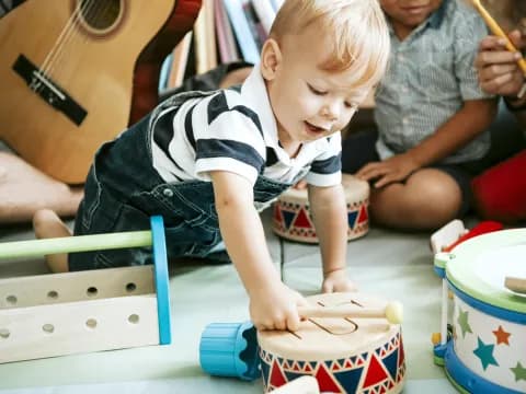 a baby playing with a toy