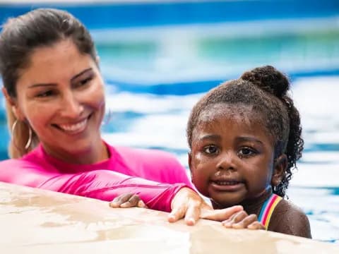 a person and a child in the water