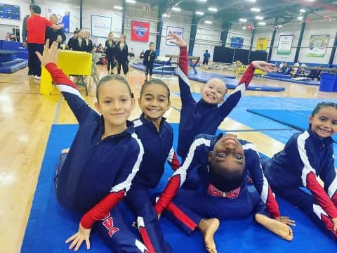 a group of people in a gym