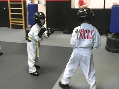 two people in white uniforms