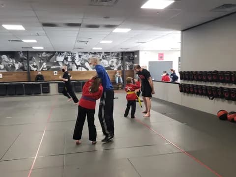 a group of people in a gym