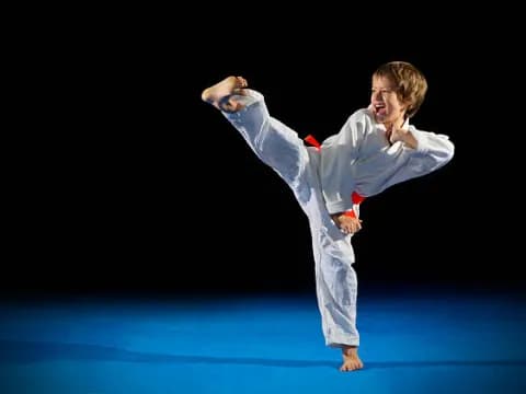 a man in a karate uniform