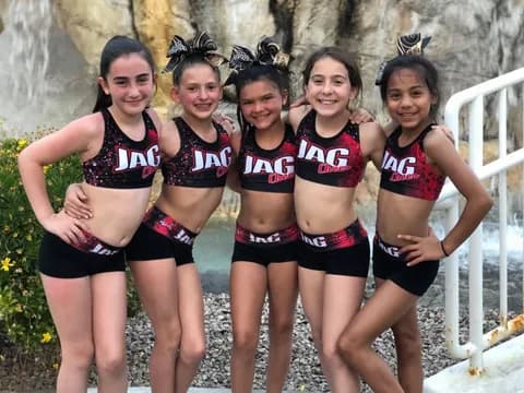 a group of women in athletic wear
