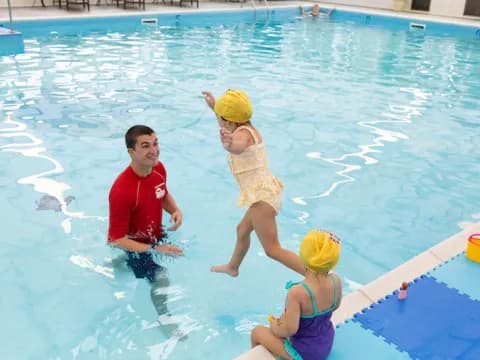 a group of people in a pool
