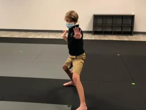 a boy wearing a mask