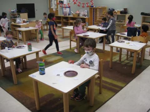 a child sitting at a table