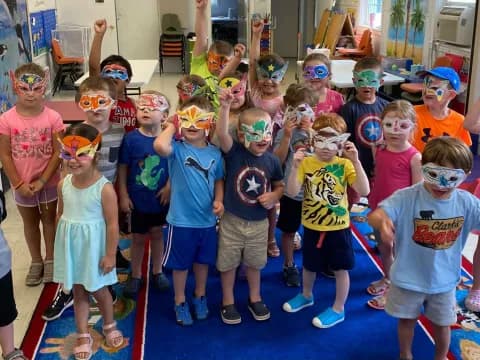 a group of children wearing masks