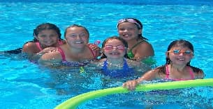a group of girls in a pool