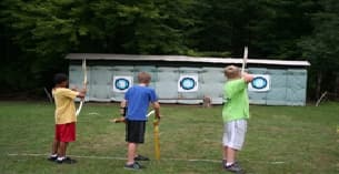 a group of people playing baseball