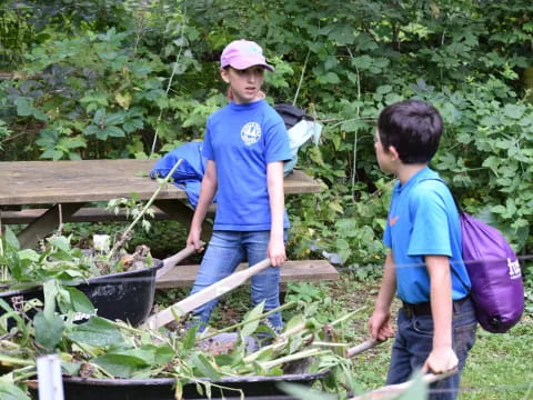 a couple of boys in a garden