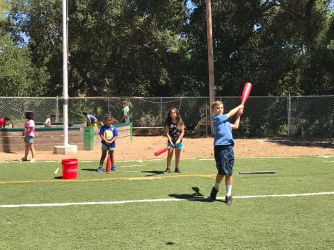 kids playing with a bat