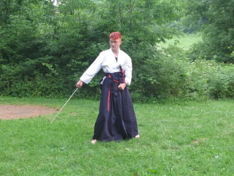 a man holding a bow and arrow