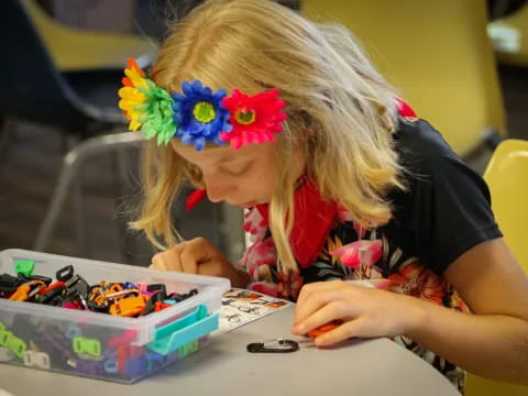 a girl playing a board game