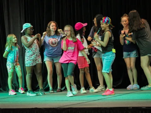 a group of girls on a stage