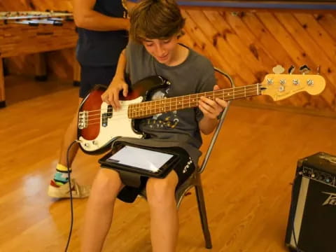 a person playing a guitar