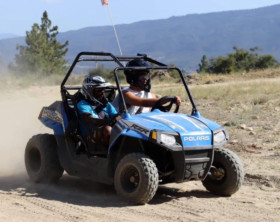 two people in a vehicle