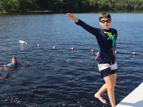 a person jumping into the water