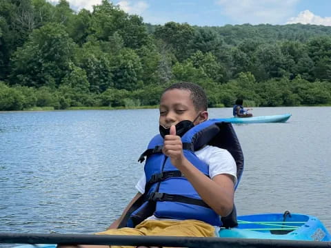 a boy in a kayak