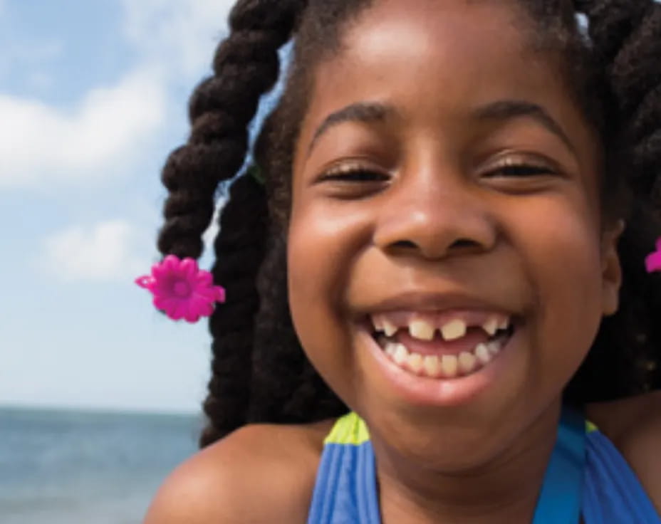 a person smiling at the camera