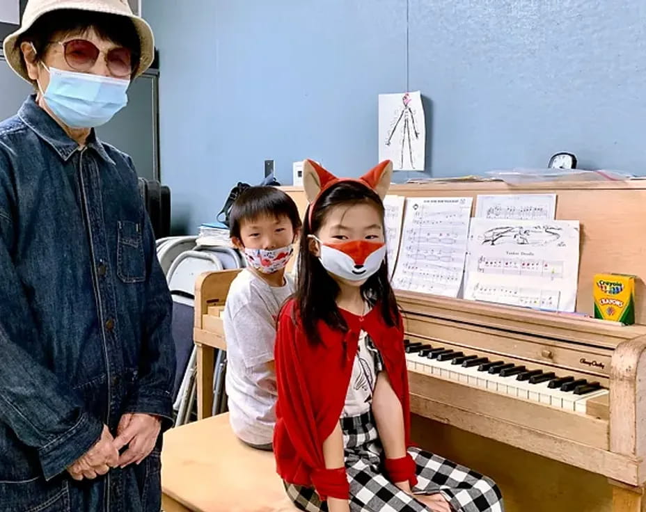 a group of kids wearing masks