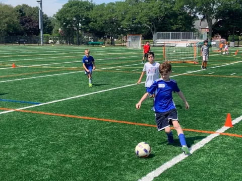 kids playing football on a field