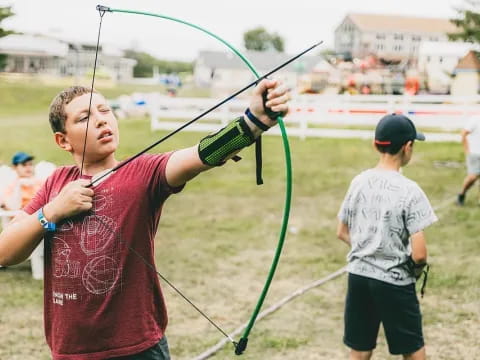 a person holding a bow and arrow
