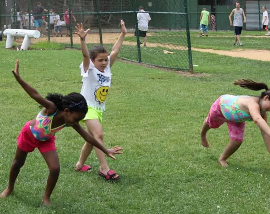 a group of girls jumping in the air