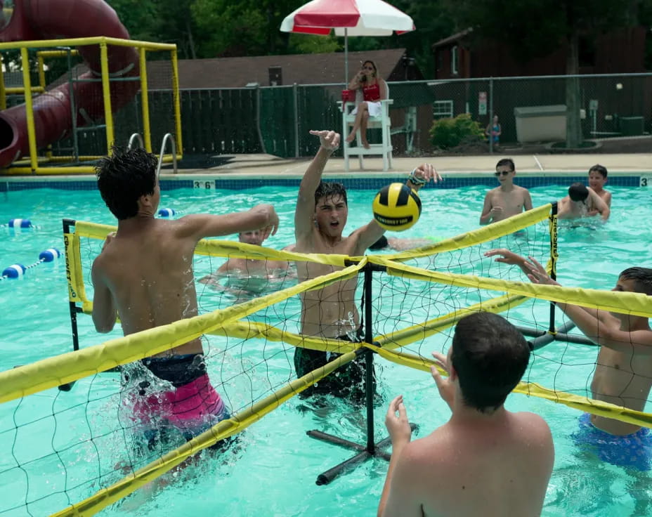 a group of people in a pool