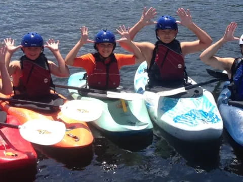 a group of people in a canoe