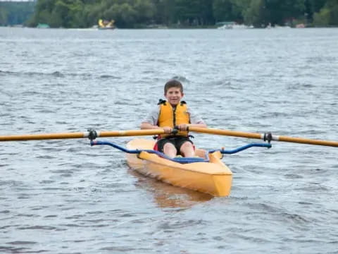 a boy in a kayak