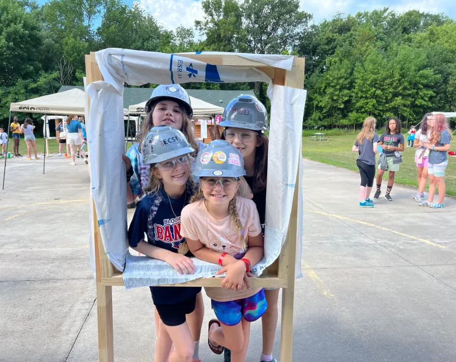 a group of people wearing helmets