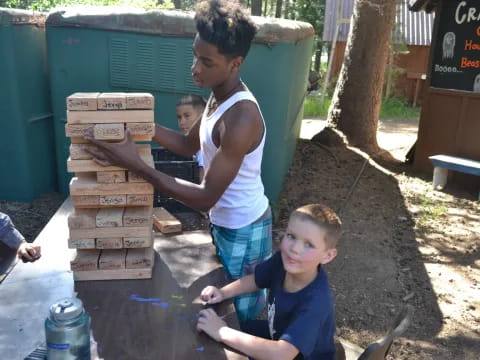 a person and a boy outside