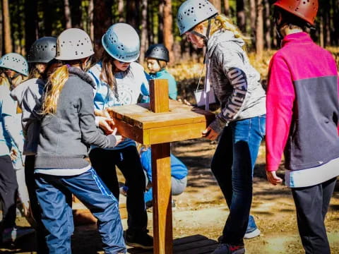 a group of people wearing helmets